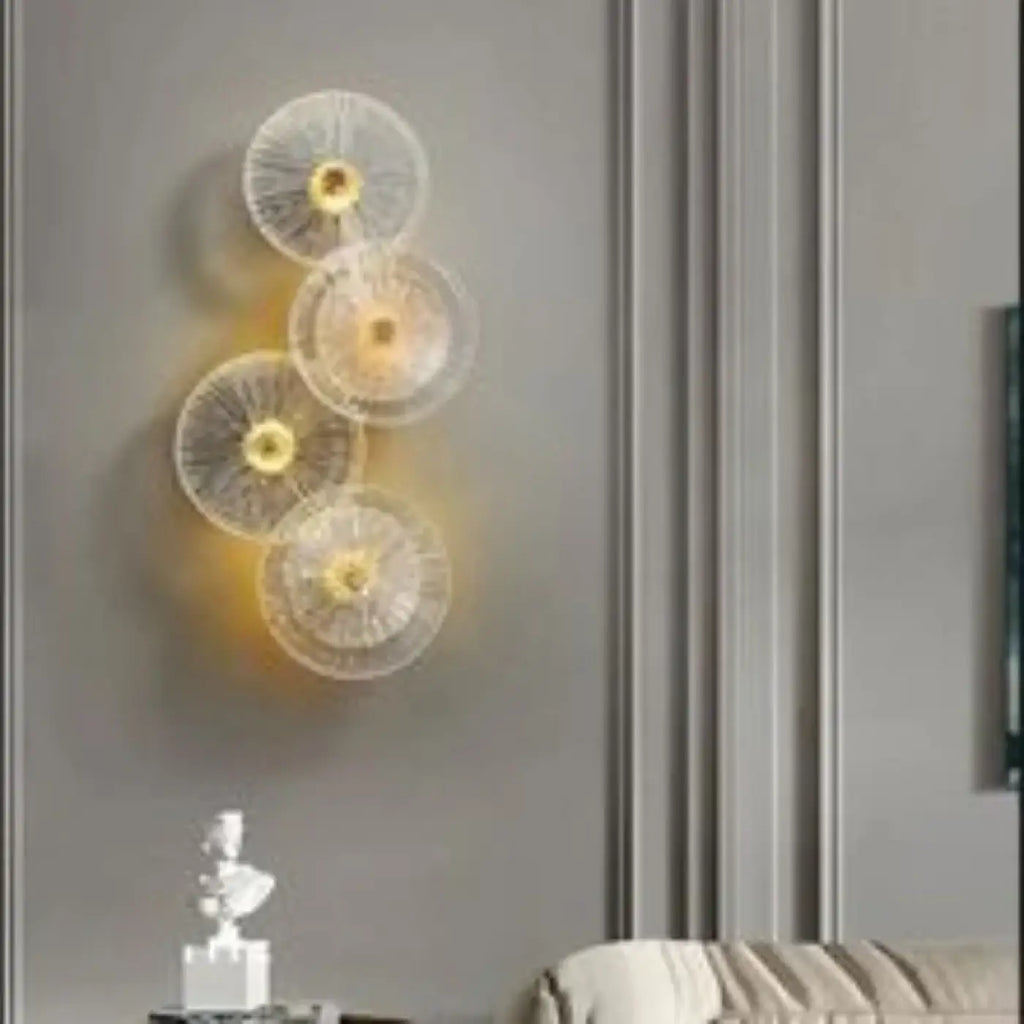 Applique LED dorée en forme de soleil