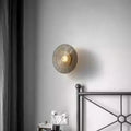 Applique LED dorée en forme de soleil