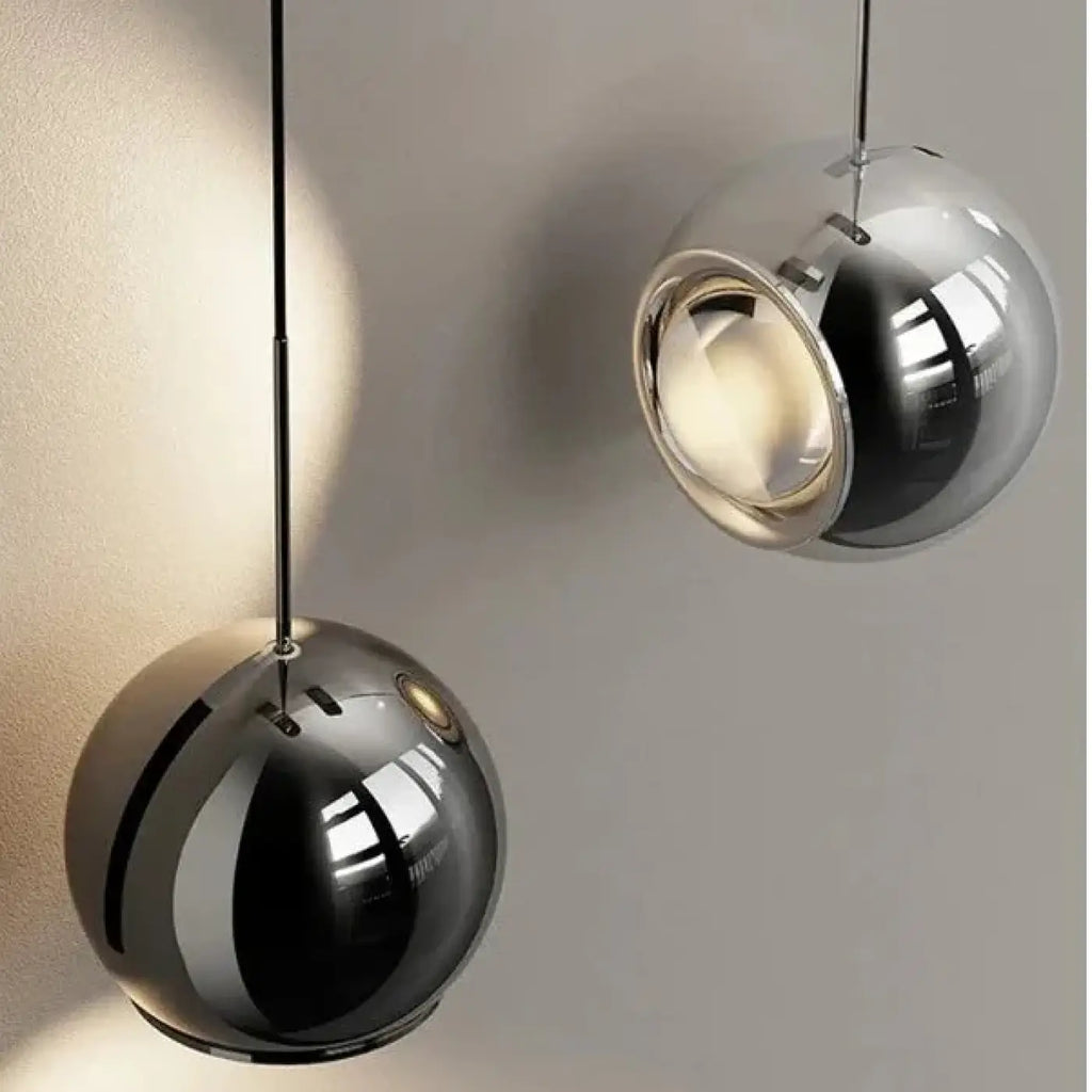 Applique murale boule orientable en métal, noire ou argentée
