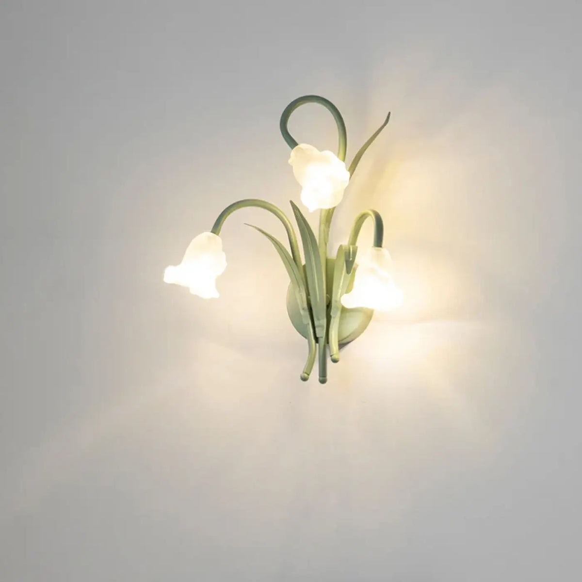 Applique murale bouquet de fleurs sur support vert