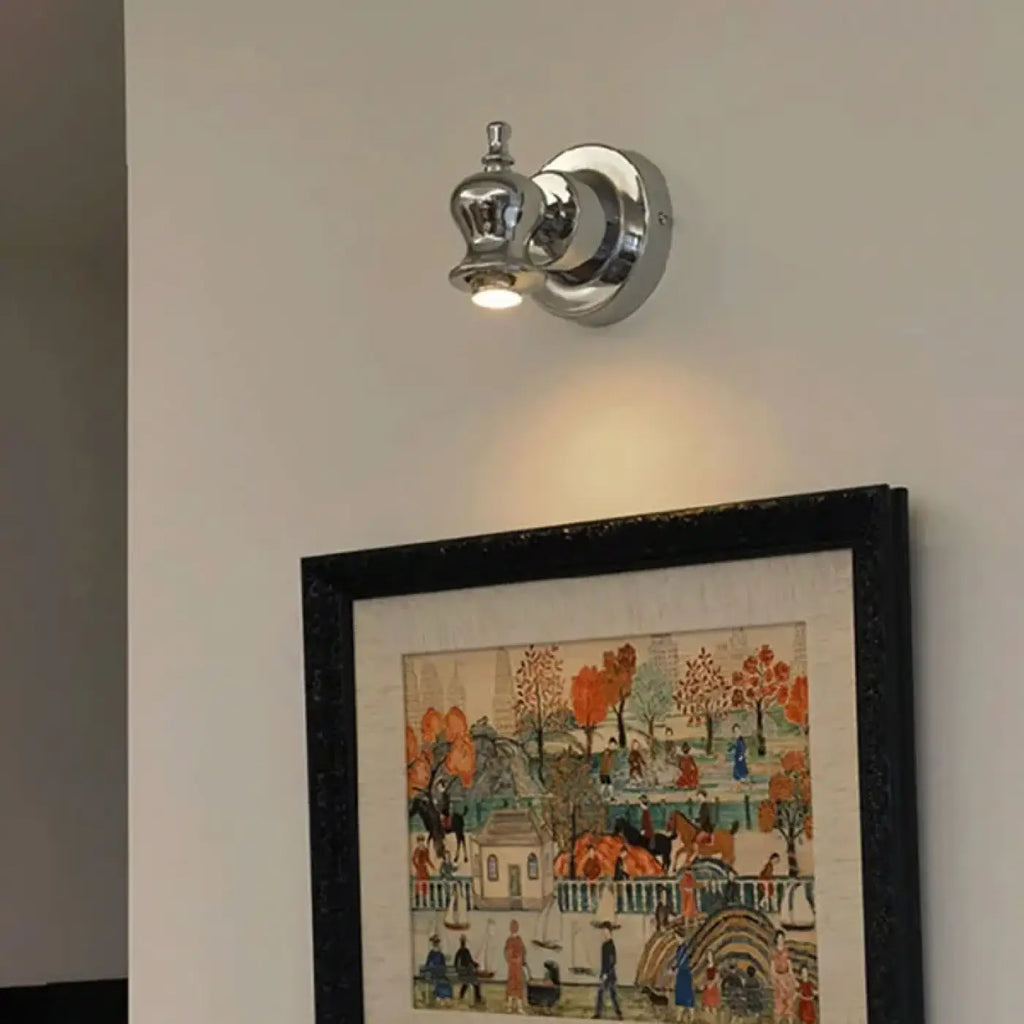 Applique murale chromée pour éclairer un tableau