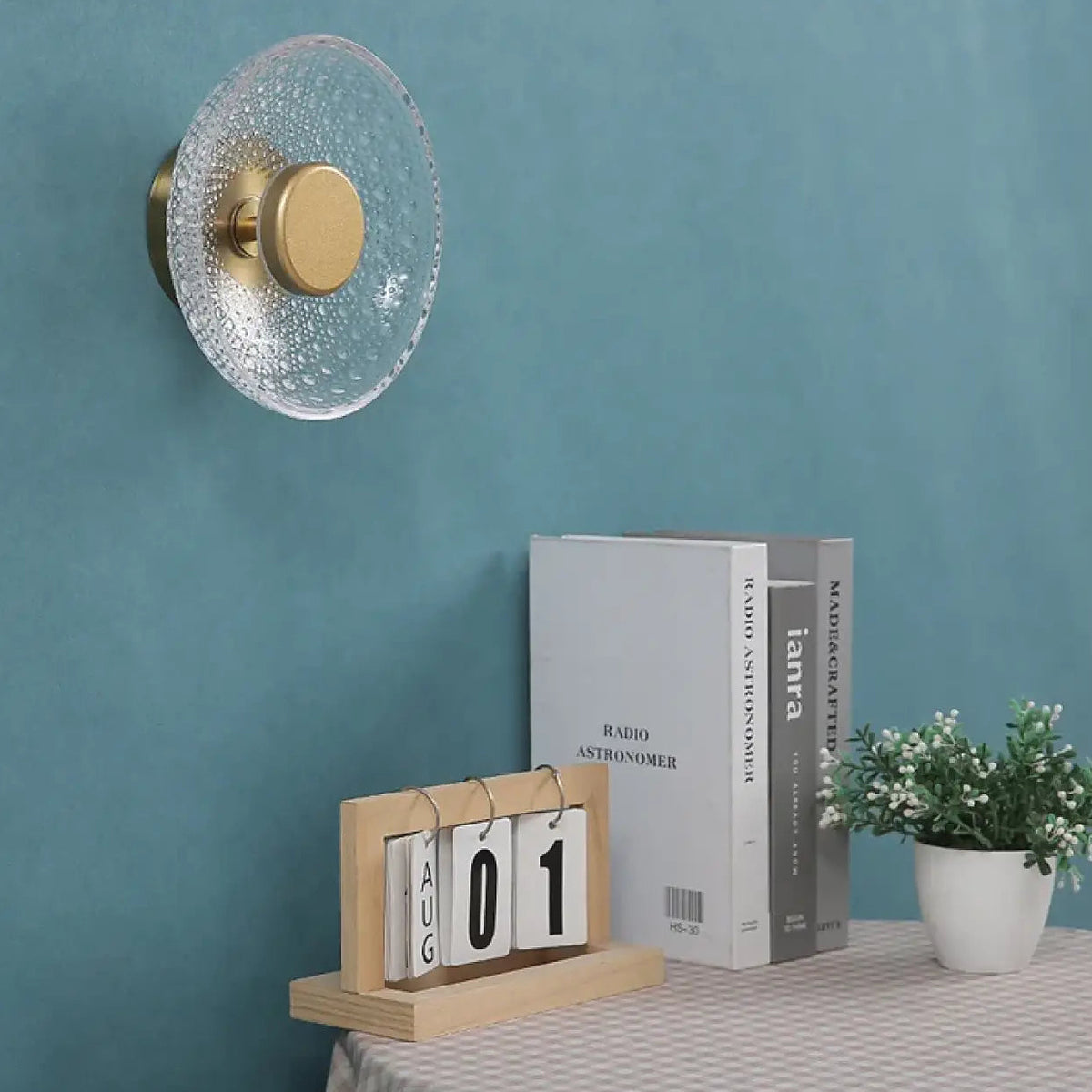Applique disque en verre texturé avec halo lumineux