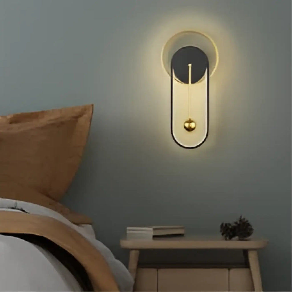 Applique murale à halo lumineux et sphère suspendue