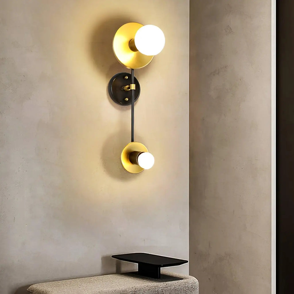 Applique murale noire et dorée, design bicolore
