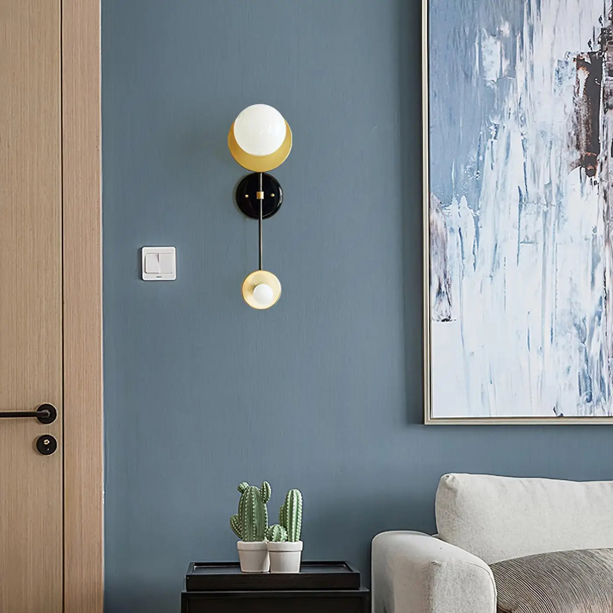 Applique murale noire et dorée, design bicolore