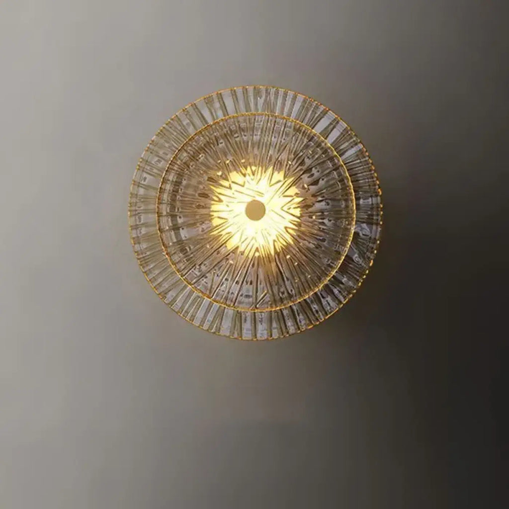 Applique murale ronde en verre et métal doré