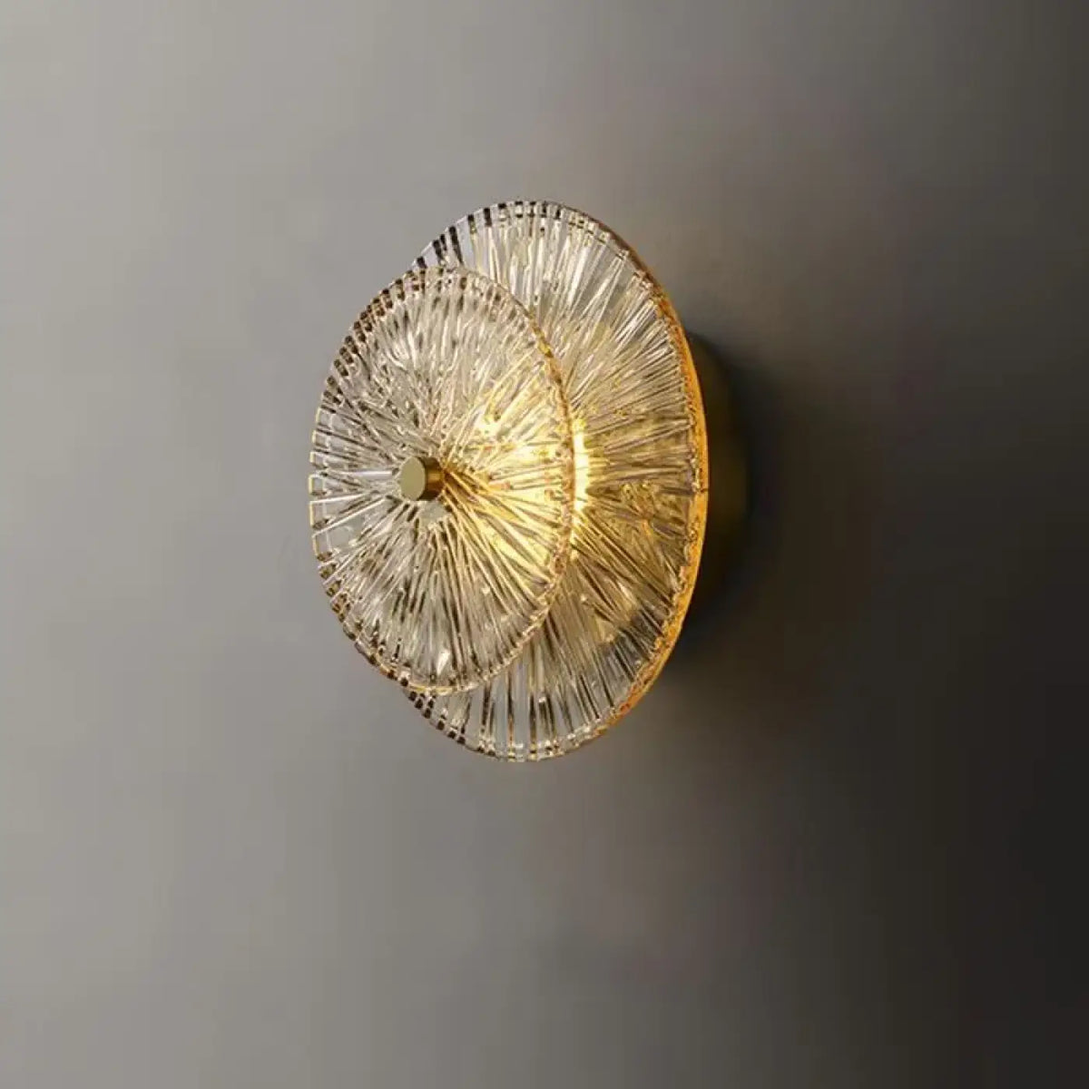 Applique murale ronde en verre et métal doré