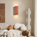 Applique murale effet pierre, cinq teintes dont rouge et marron, rouge