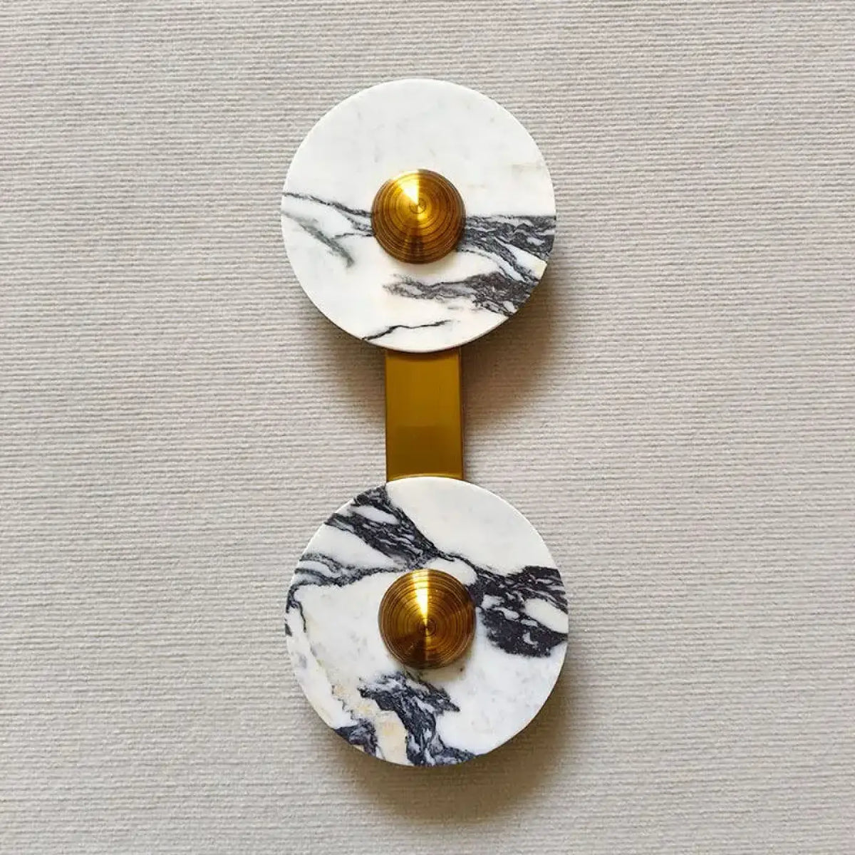 Applique murale en marbre blanc à deux disques, détails dorés