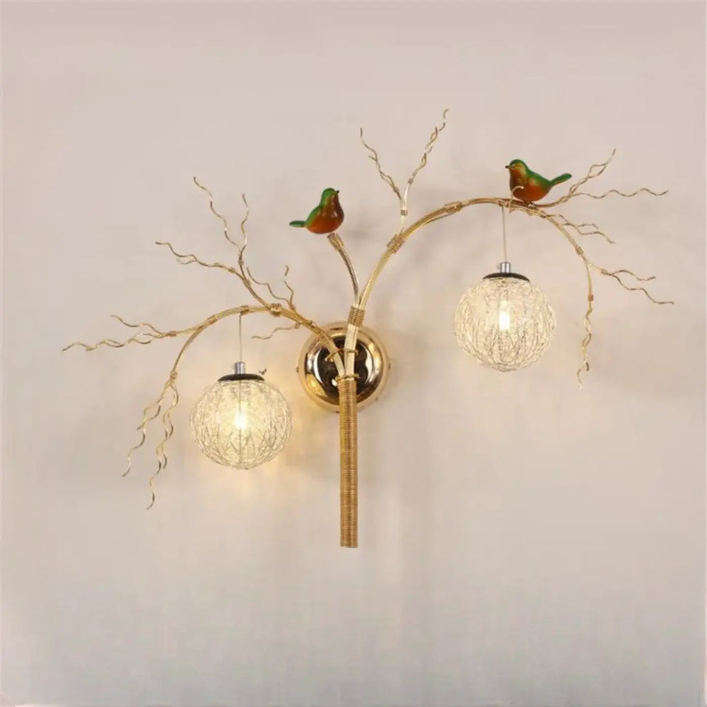 Applique murale branche dorée avec oiseaux et sphères lumineuses