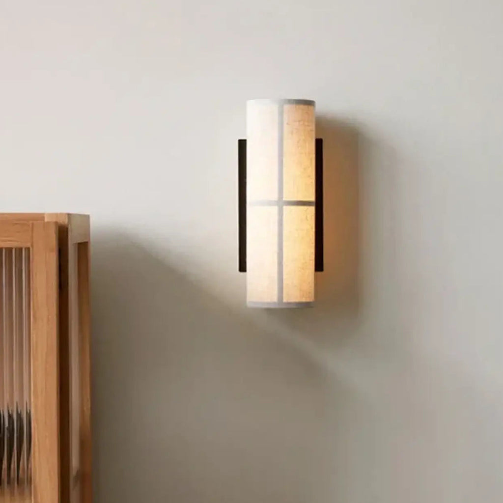Applique murale en tissu clair pour une lumière douce
