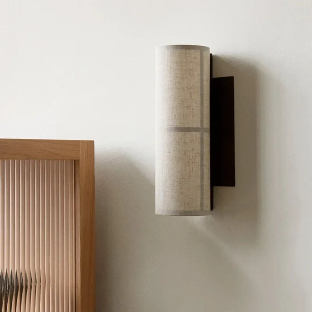 Applique murale en tissu clair pour une lumière douce