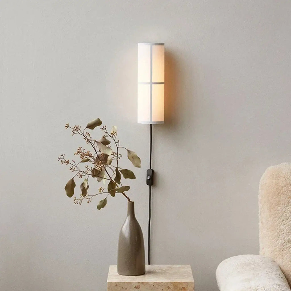 Applique murale en tissu clair pour une lumière douce