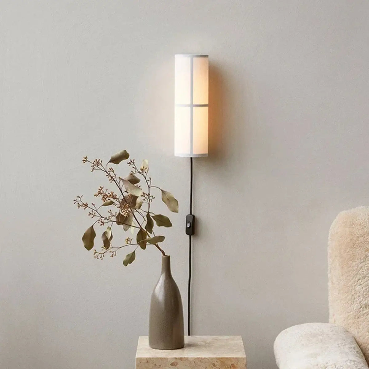 Applique murale en tissu clair pour une lumière douce