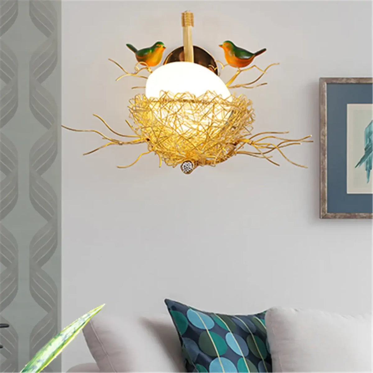 Applique murale nid doré, oiseaux autour d'une boule lumineuse
