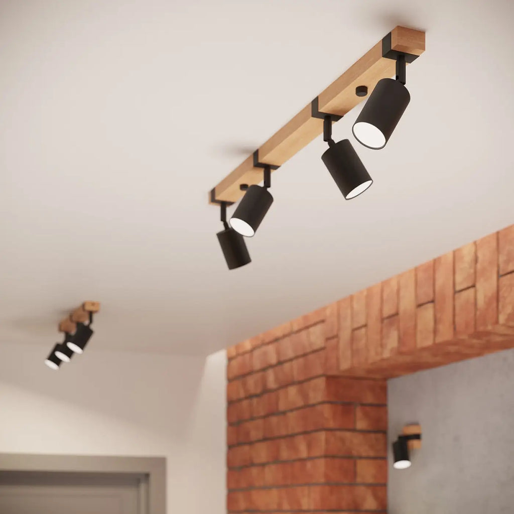 Applique murale spot orientable noir sur platine en bois naturel