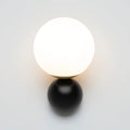 Applique murale globe opalin sur bras noir et doré, culot E14