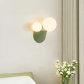 Applique murale support cannelé et deux boules blanches, vert