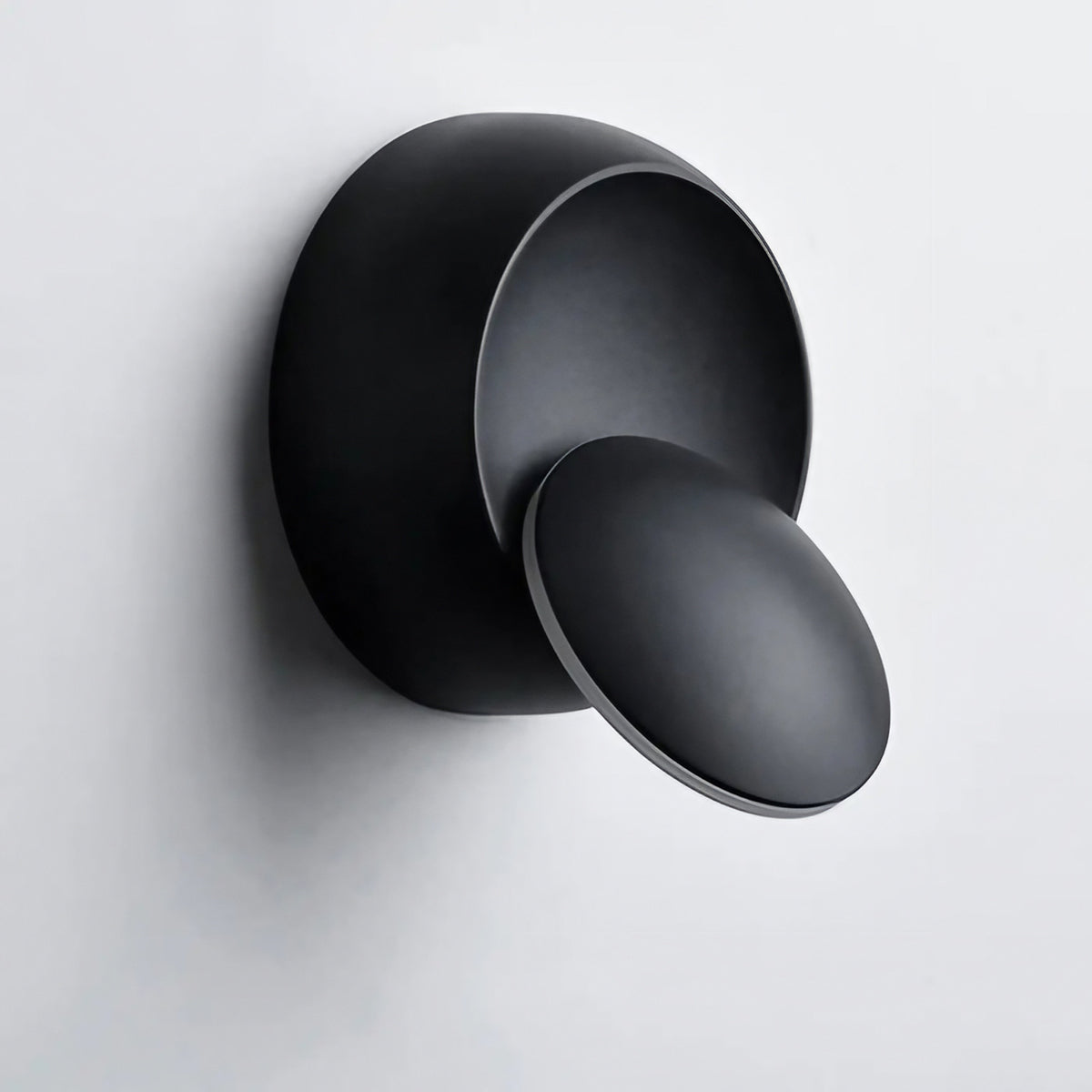 Applique murale ronde sur support coulissant, noire ou blanche