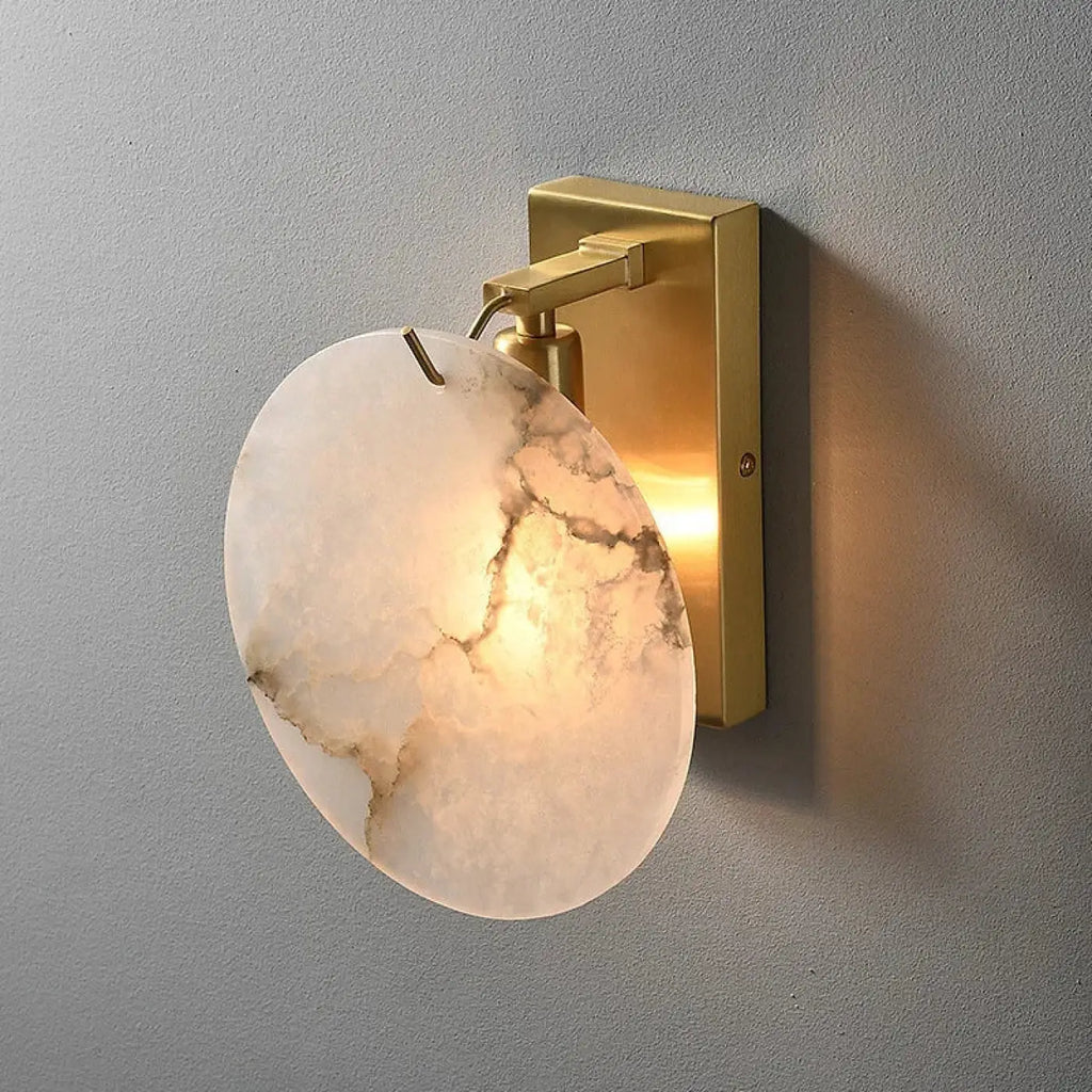 Applique murale ronde effet marbre blanc, support doré
