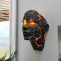 Applique murale sculpture de visage fissuré, teinte ambrée