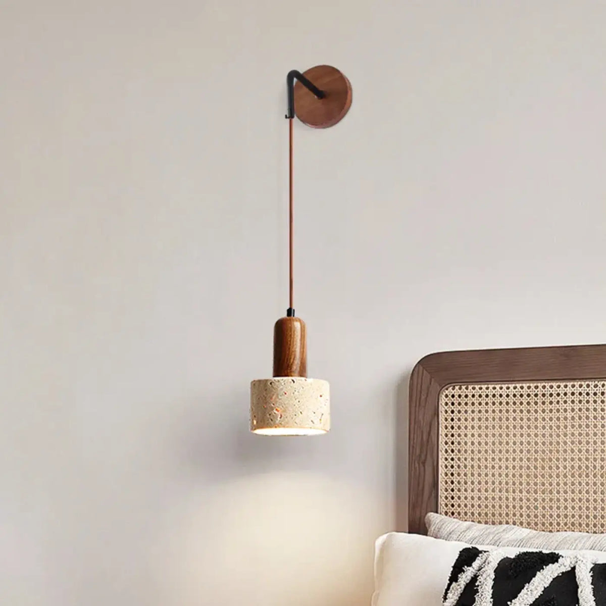 Applique murale à sphère suspendue au-dessus du lit