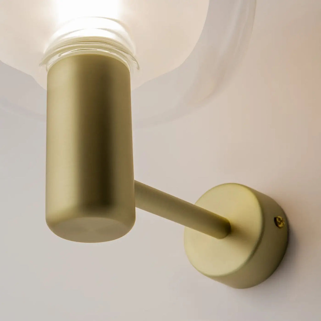 Applique murale à deux globes en verre sur branche dorée
