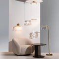 Lampadaire LED pied finition laiton et abat-jour en verre clair