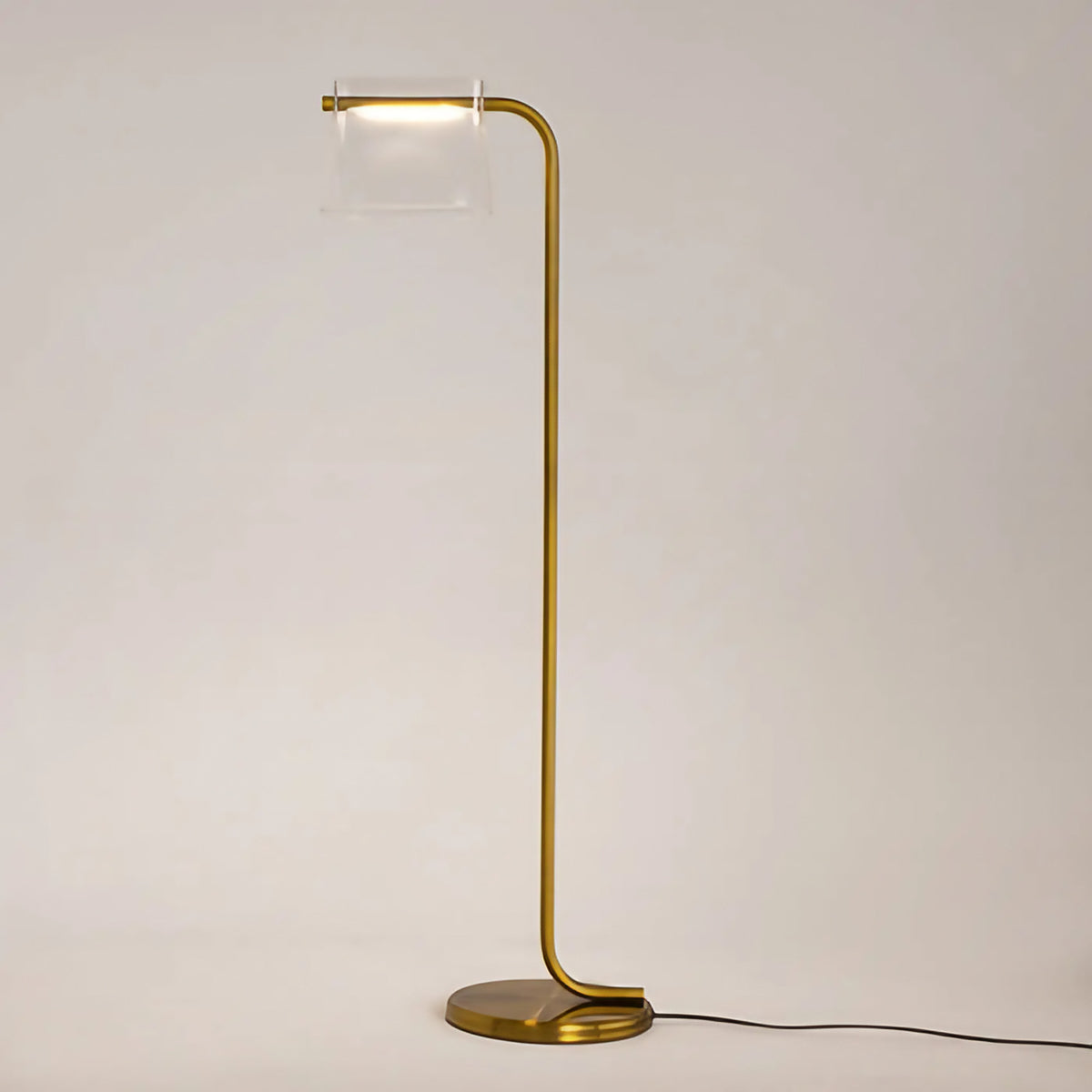 Lampadaire LED pied finition laiton et abat-jour en verre clair