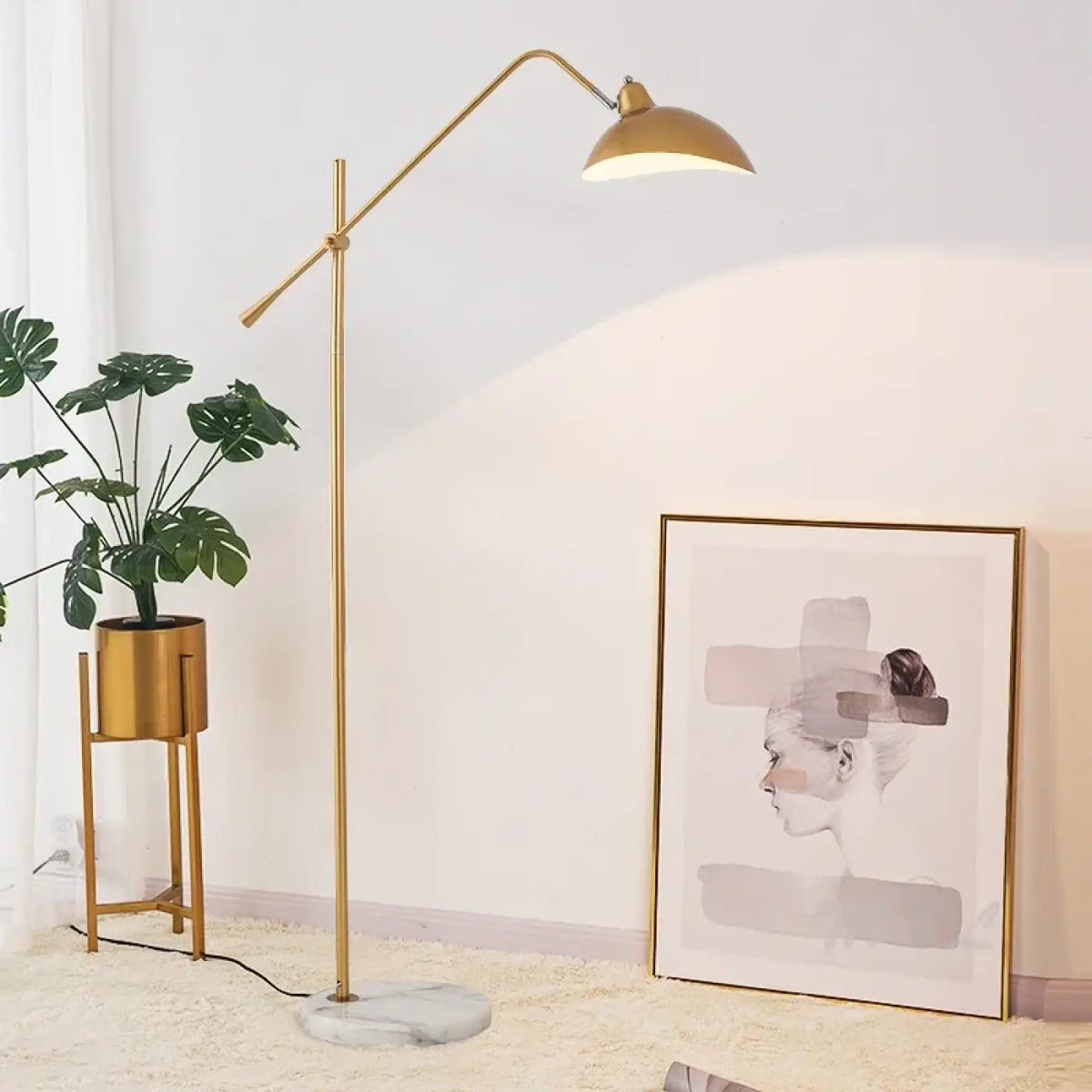 Lampadaire contemporain en métal à tête orientable, noir ou doré, doré