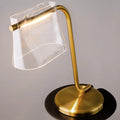 Lampe à poser LED base finition laiton et abat-jour en verre clair
