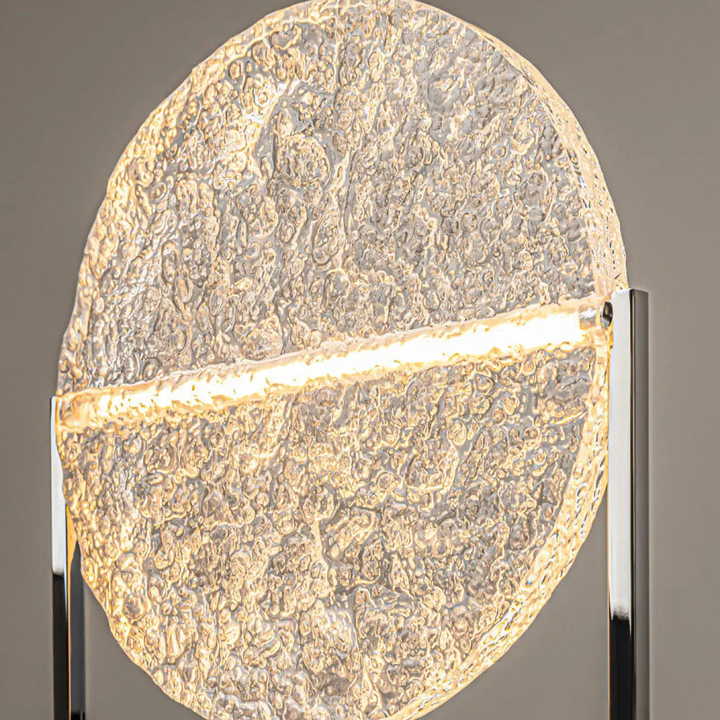 Lampe à poser LED disque en verre martelé sur pied argenté