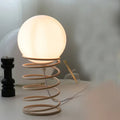 Lampe à poser au pied en spirale, cinq modèles