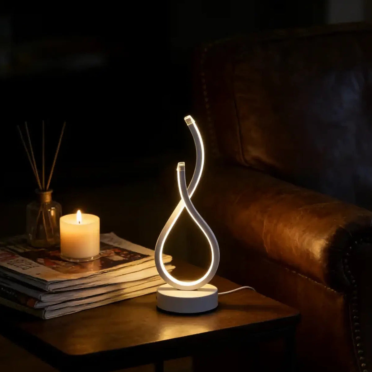 Lampe à poser en boucle lumineuse, ligne sculpturale