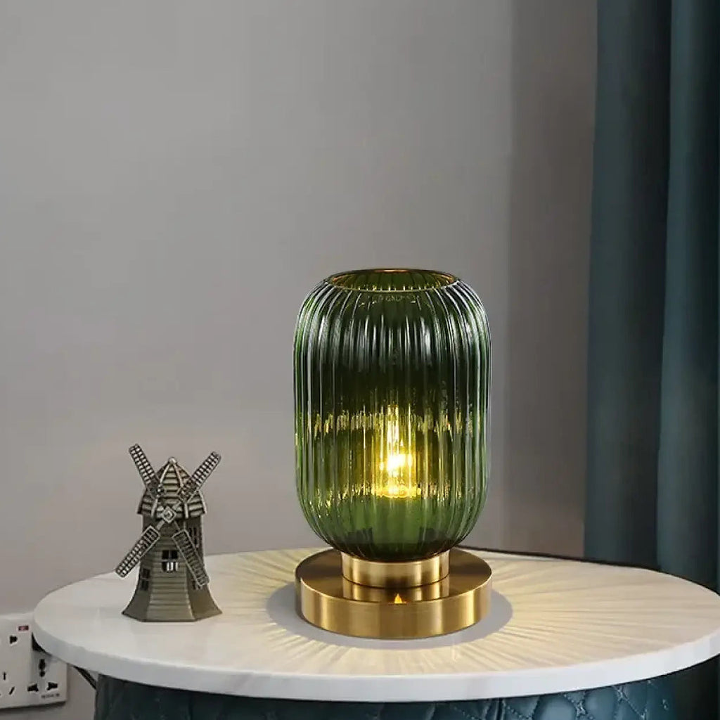 Lampe de table en verre sur base dorée, deux tailles