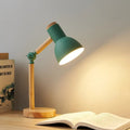 Lampe à poser à bras articulé et bois naturel, quatre coloris