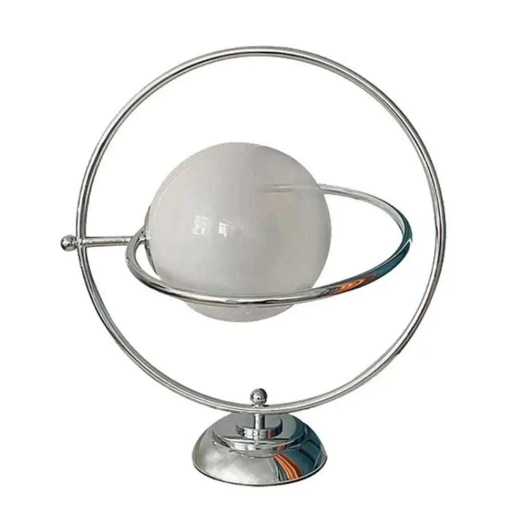 Lampe à poser effet planète sur base métallique