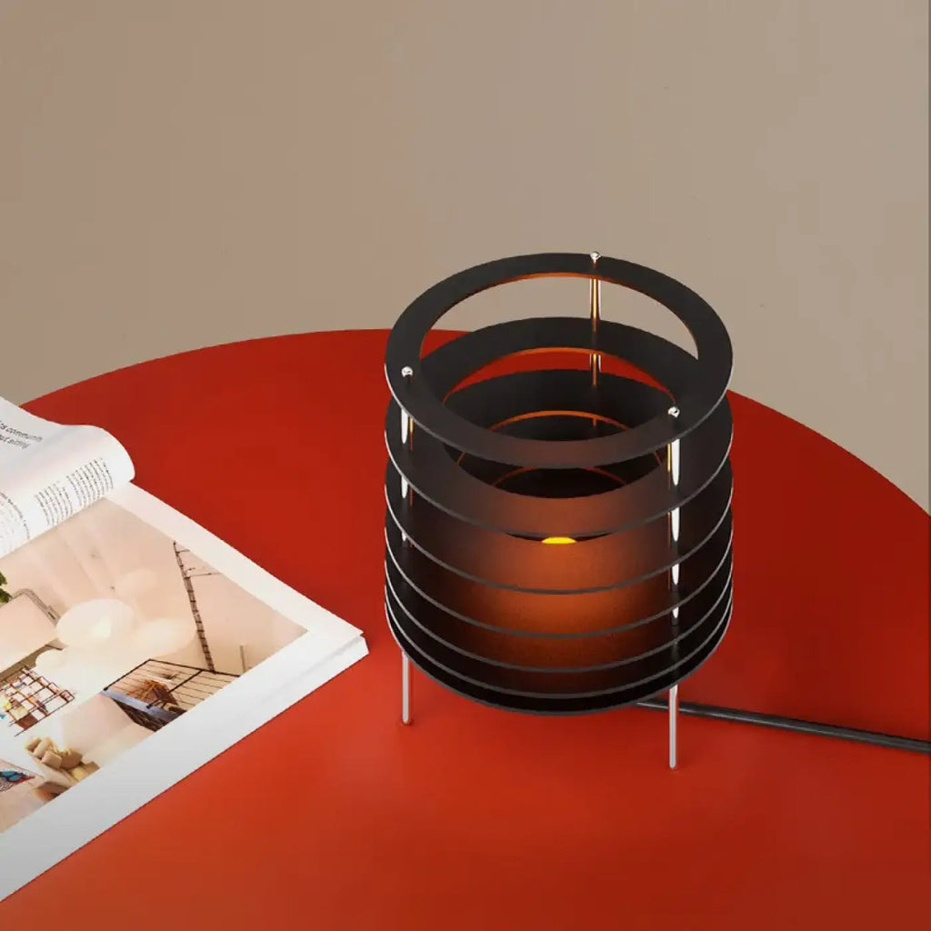 Lampe à poser aux anneaux superposés, bleue ou noire