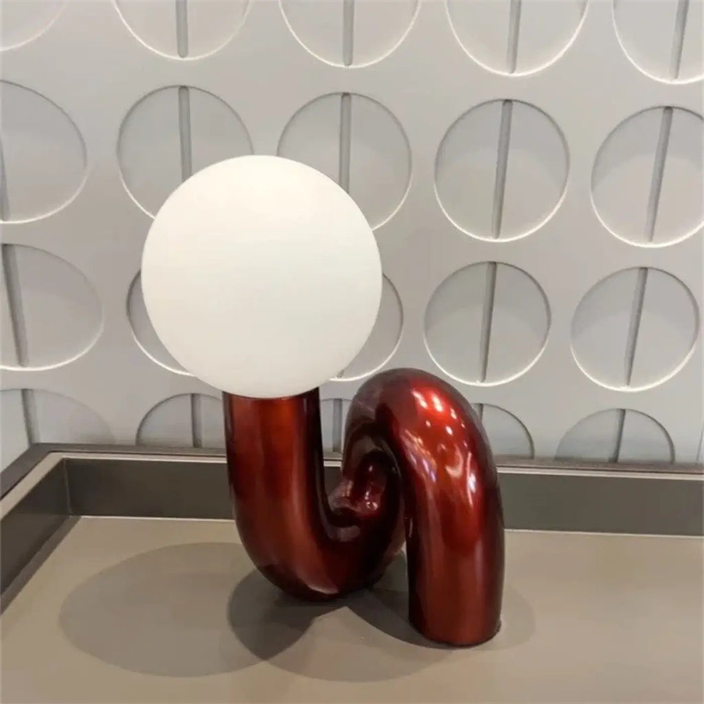 Lampe de table aux lignes arrondies, quatre choix de lumière