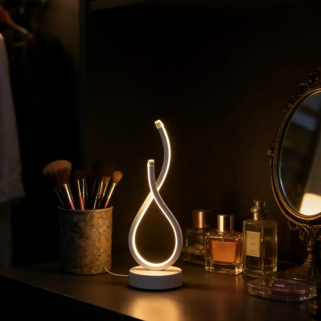 Lampe à poser en boucle lumineuse, ligne sculpturale
