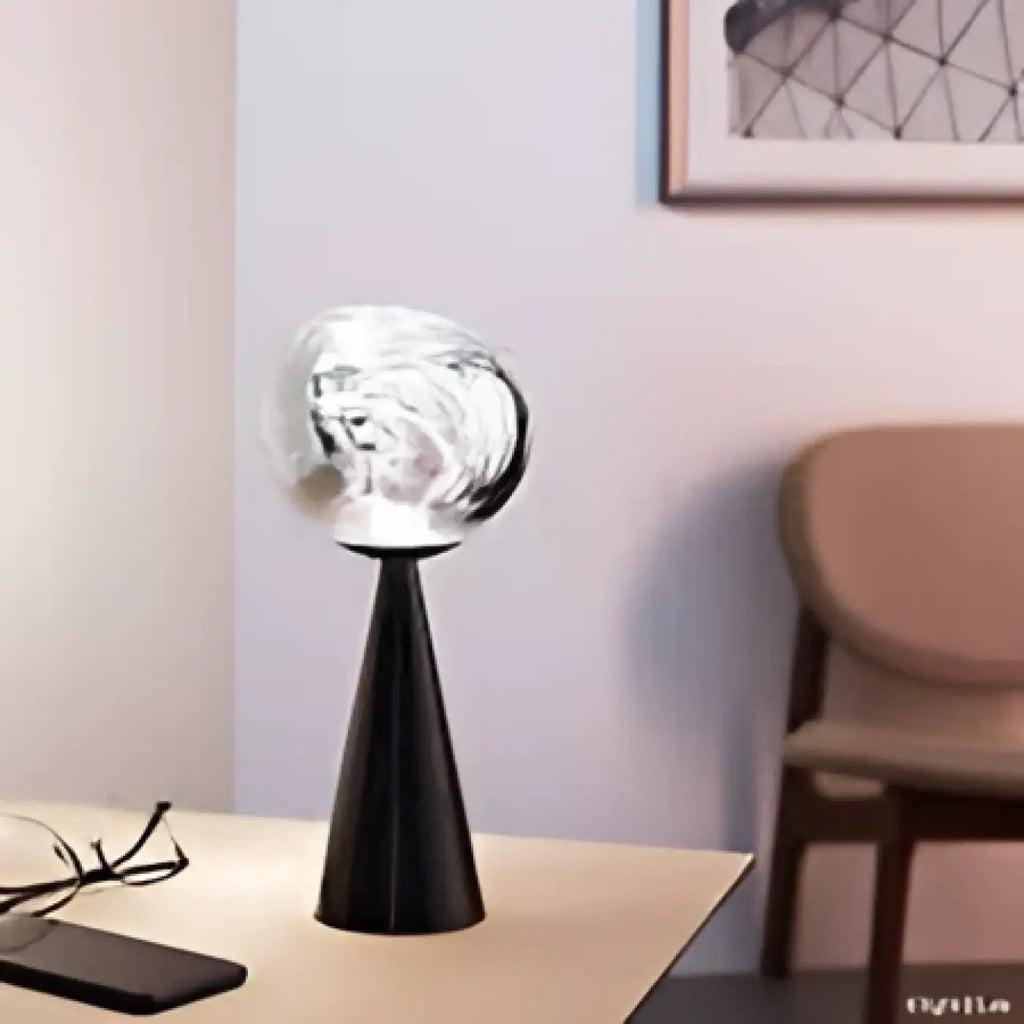 Lampe à poser à globe effet miroir aux reflets fumés