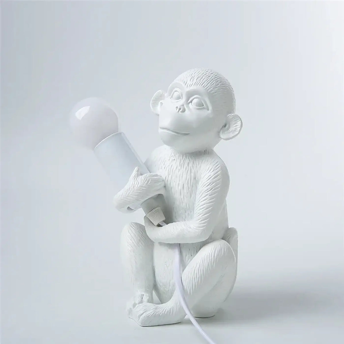 Lampe singe assis à lumière intégrée, blanc, doré ou noir, blanc