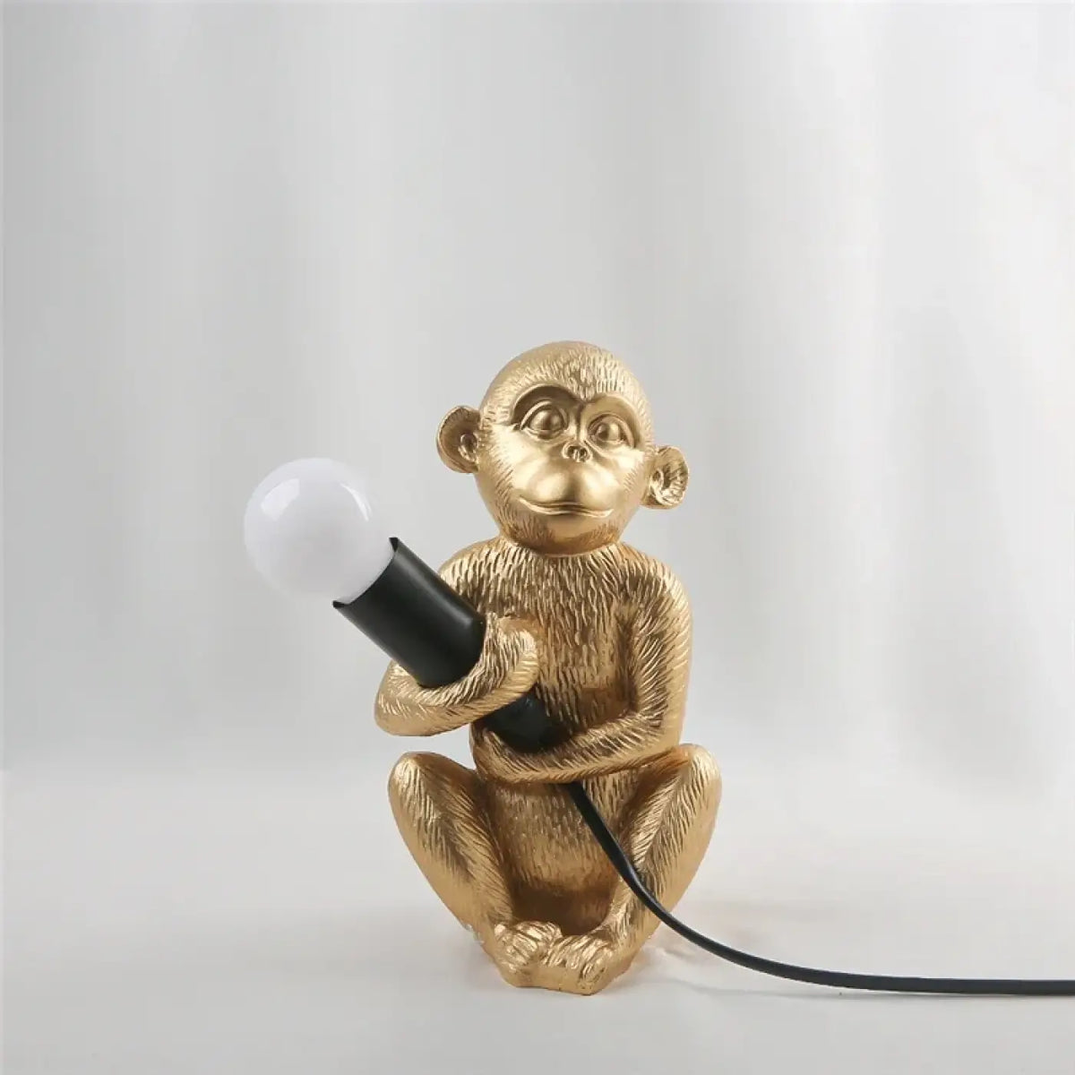 Lampe singe assis à lumière intégrée, blanc, doré ou noir, doré