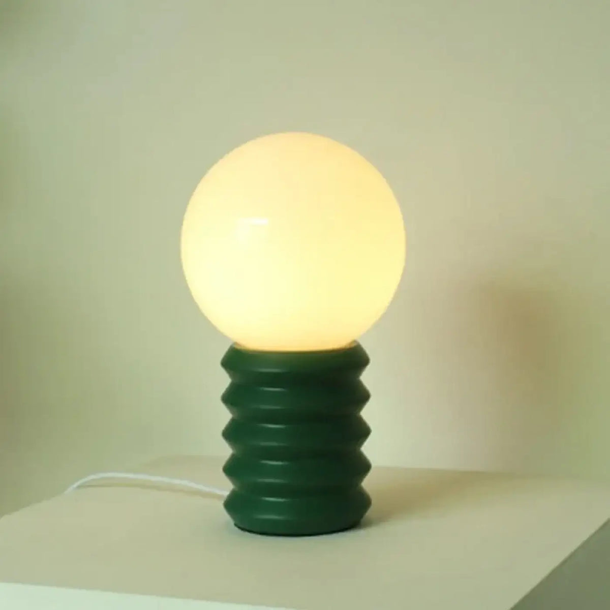 Lampe à poser au pied en spirale, cinq modèles