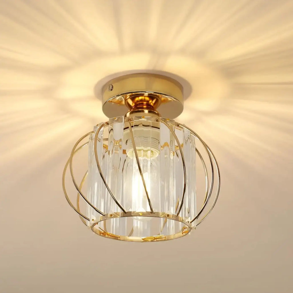 Plafonnier en cristal transparent et métal doré