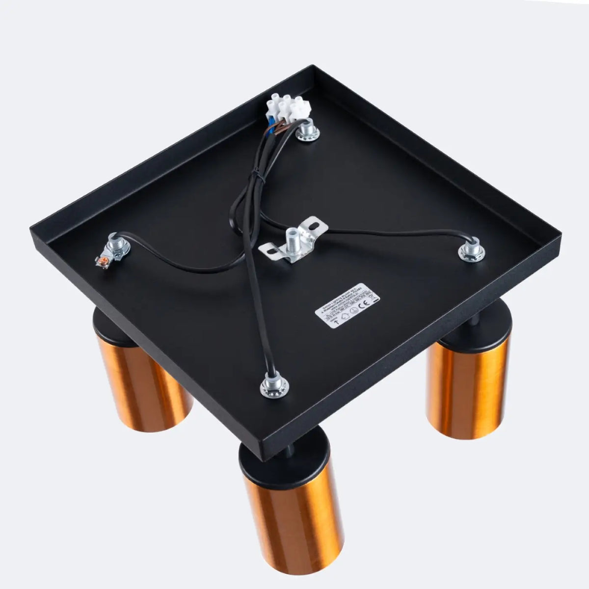 Plafonnier 4 spots orientables noir et cuivre, sur platine de 25 cm