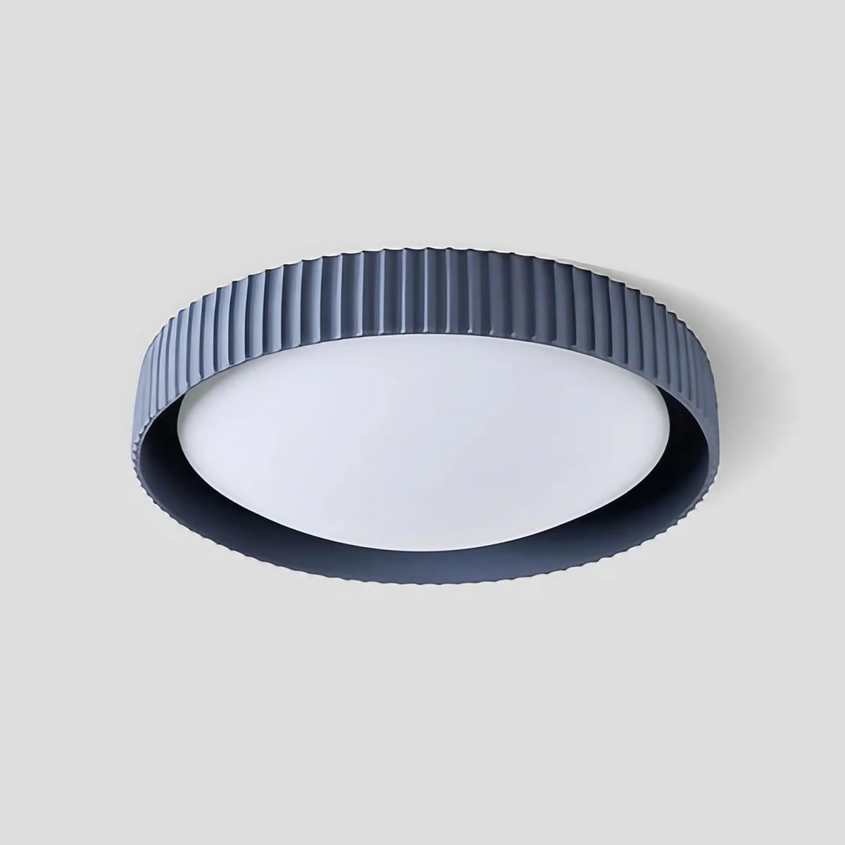 Plafonnier rond minimaliste à reliefs graphiques, bleu