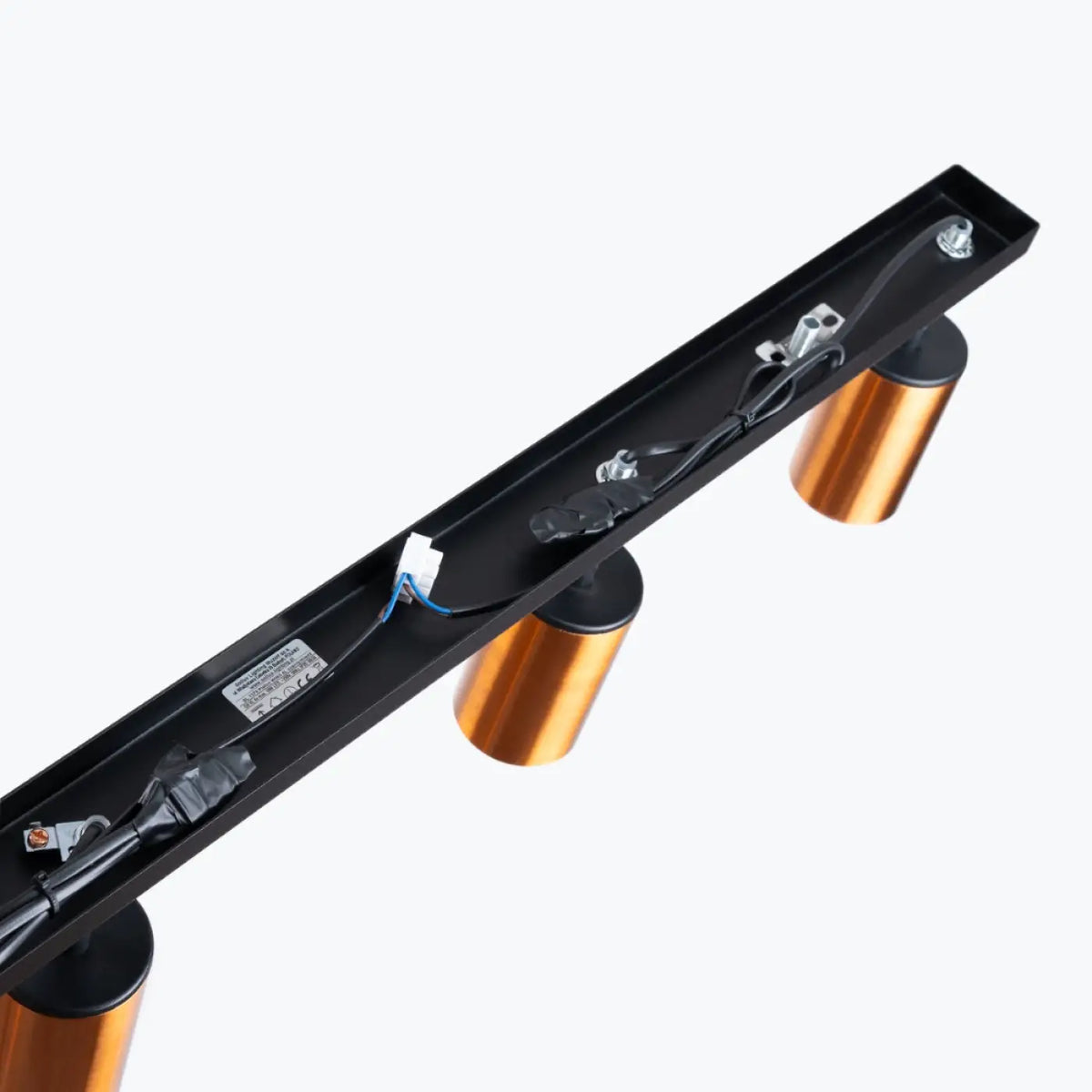 Plafonnier 4 spots orientables noir et cuivre, rampe de 82 cm