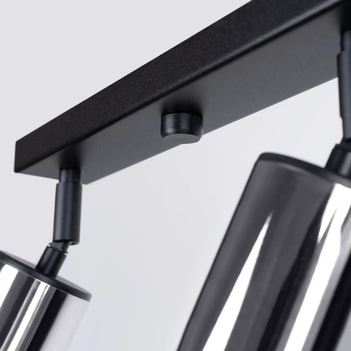 Plafonnier 4 spots orientables noir et chrome, rampe de 82 cm
