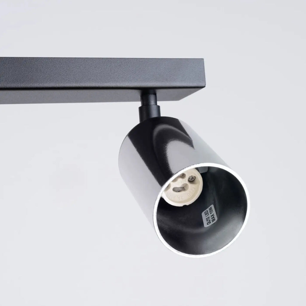 Plafonnier 4 spots orientables noir et chrome, rampe de 82 cm